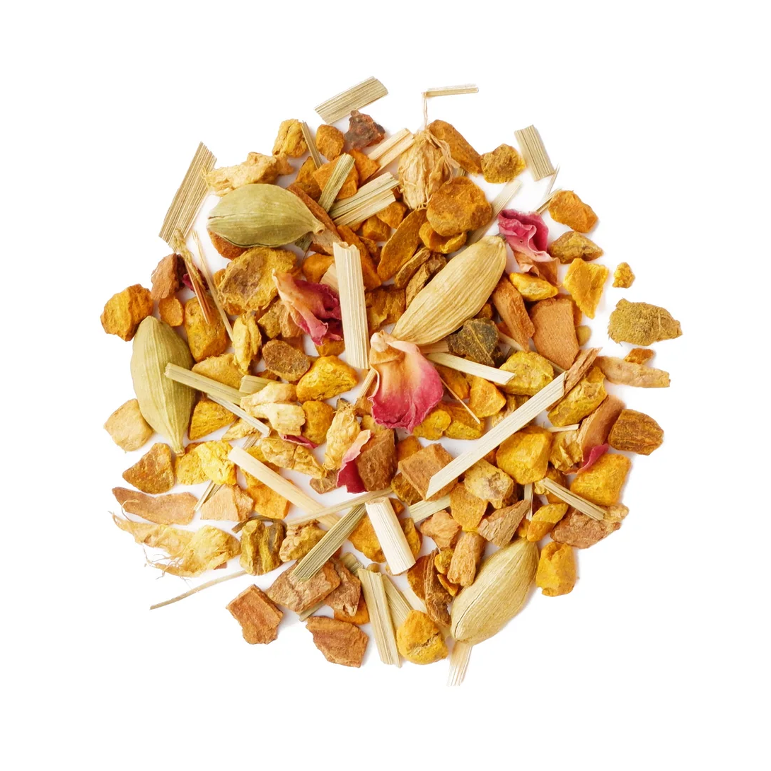 loose leaf turmeric chai tea with a white background
